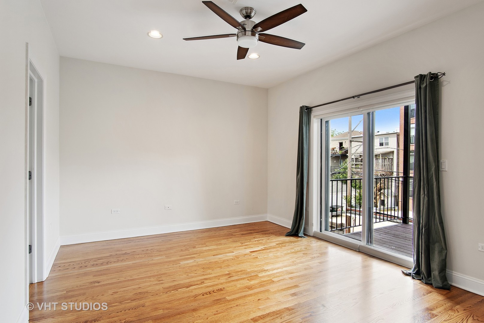 1502 West Augusta Boulevard, Unit 3W Chicago, IL 60642 - Photo 12 of 23 a view of an empty room with a window