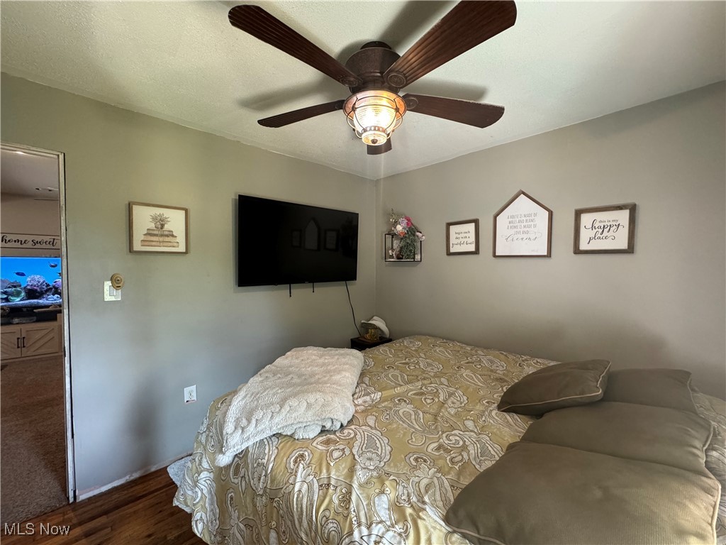 1480 Jerrys Run Road Belleville, WV 26133 - Photo 31 of 48 Bedroom with ceiling fan and dark hardwood / wood-style floors