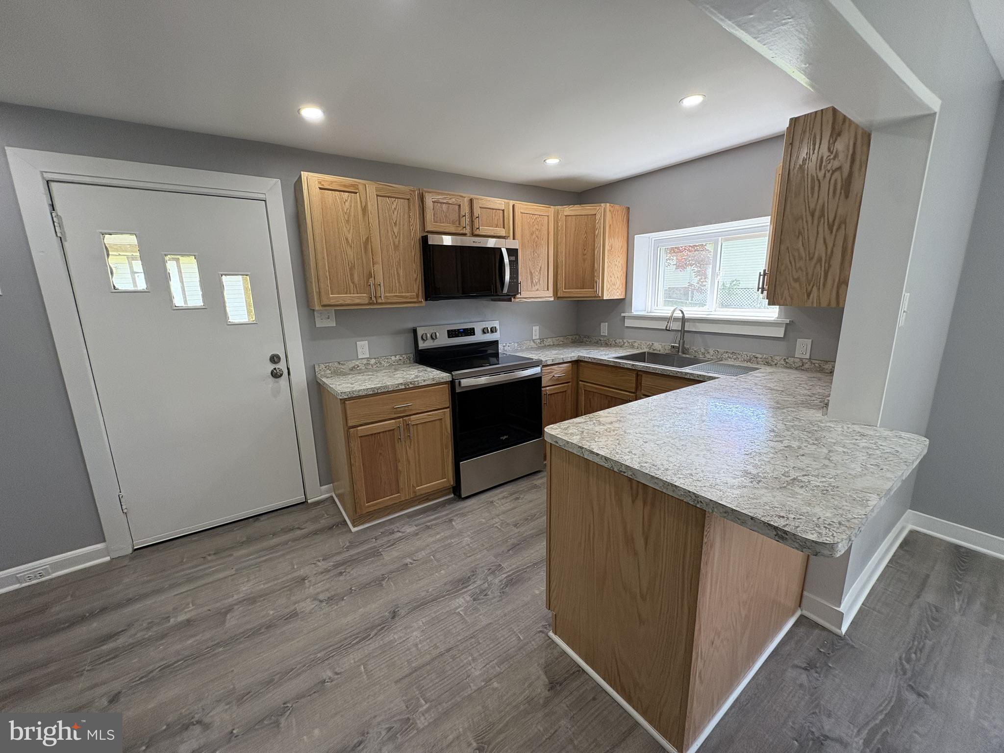 3541 Mount Road Aston, PA 19014 - Photo 4 of 14 Modern kitchen with warm wood accents.
