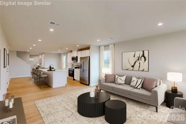 a living room with furniture and a couch