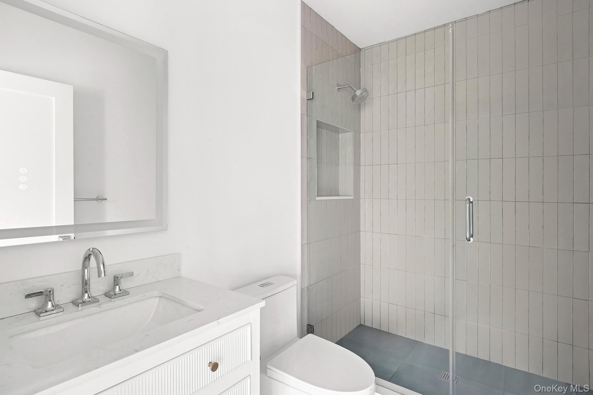 5 Pheasant Lane Remsenburg, NY 11960 - Photo 15 of 27 Full bath featuring vanity and a stall shower