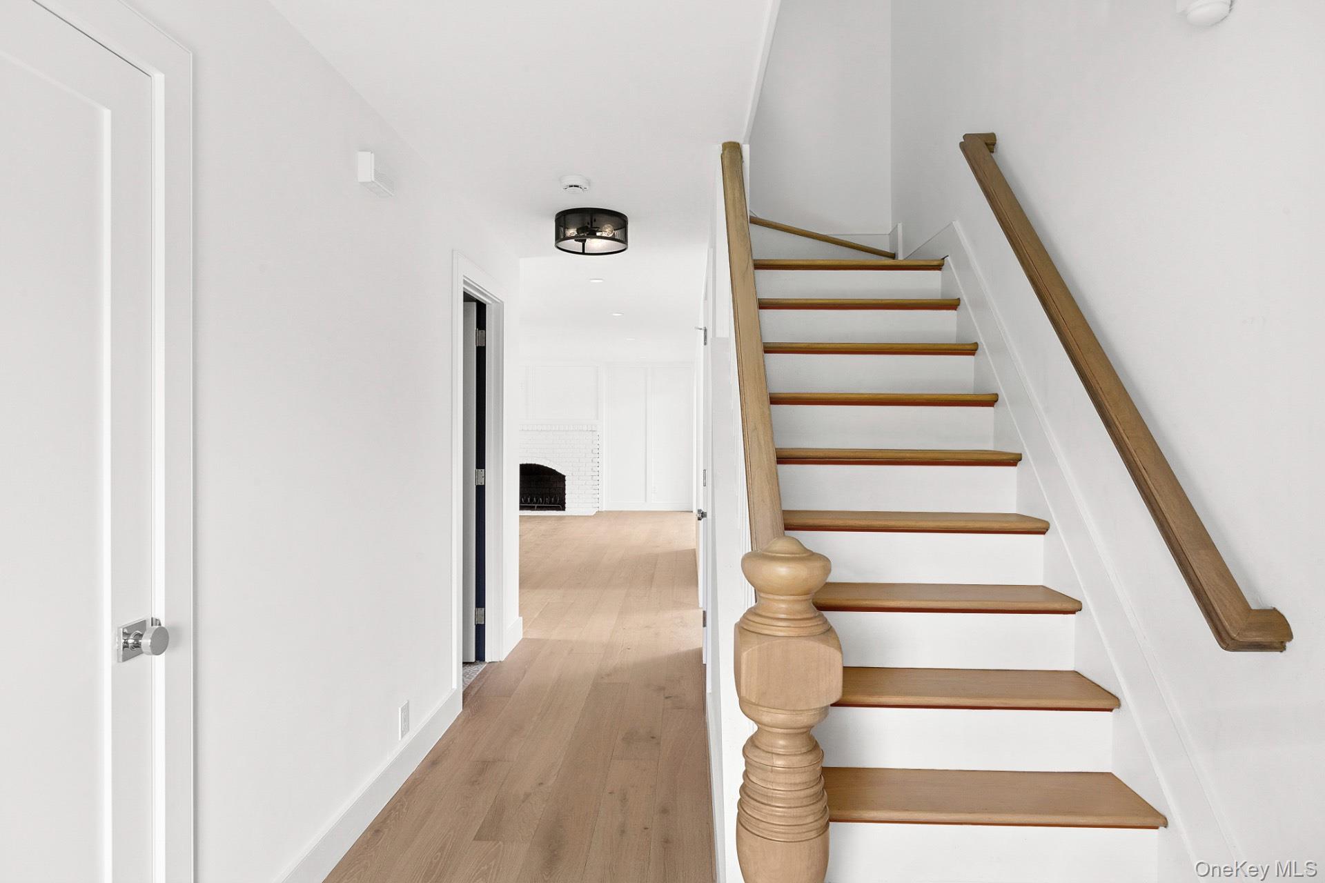 5 Pheasant Lane Remsenburg, NY 11960 - Photo 2 of 32 a view of entryway with wooden floor