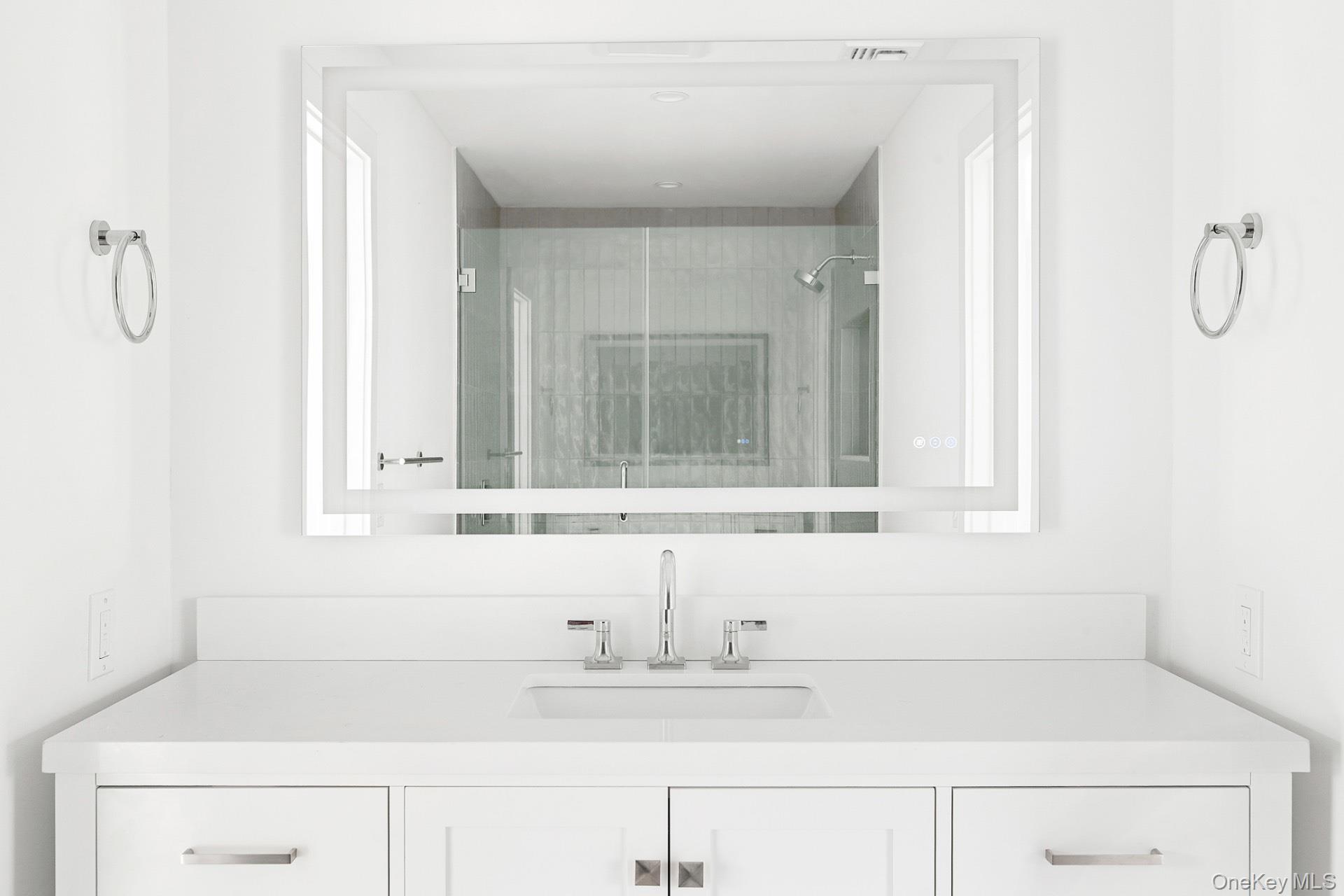 5 Pheasant Lane Remsenburg, NY 11960 - Photo 24 of 27 Bathroom with vanity and a stall shower