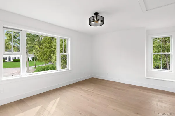 a view of a room that has a window in it