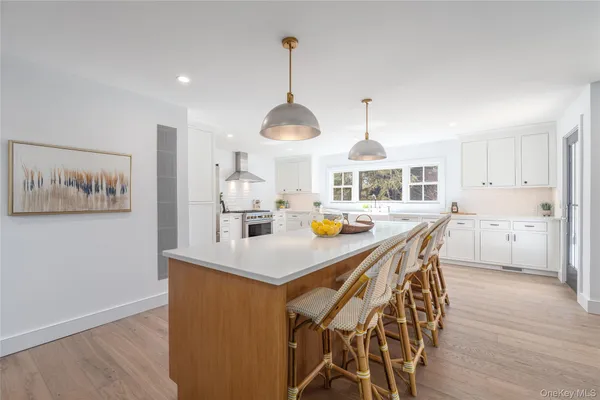 a view of a dining room with furniture and window