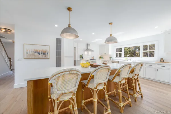 a very nice looking dining room with a table and chairs