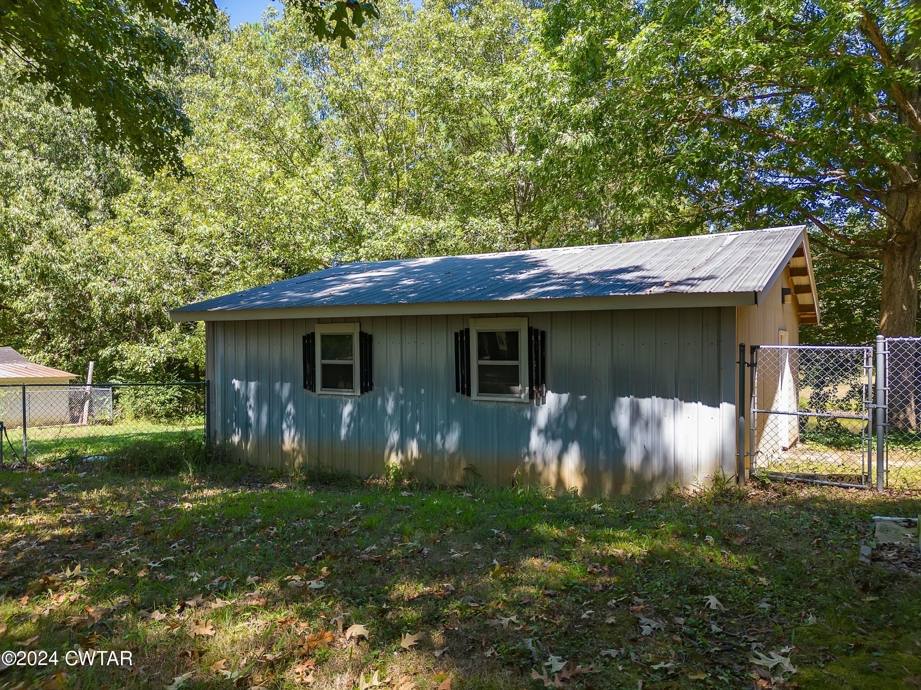 63 Deep Gap Road Jackson, TN 38301 - Photo 30 of 31 a view of a house with backyard