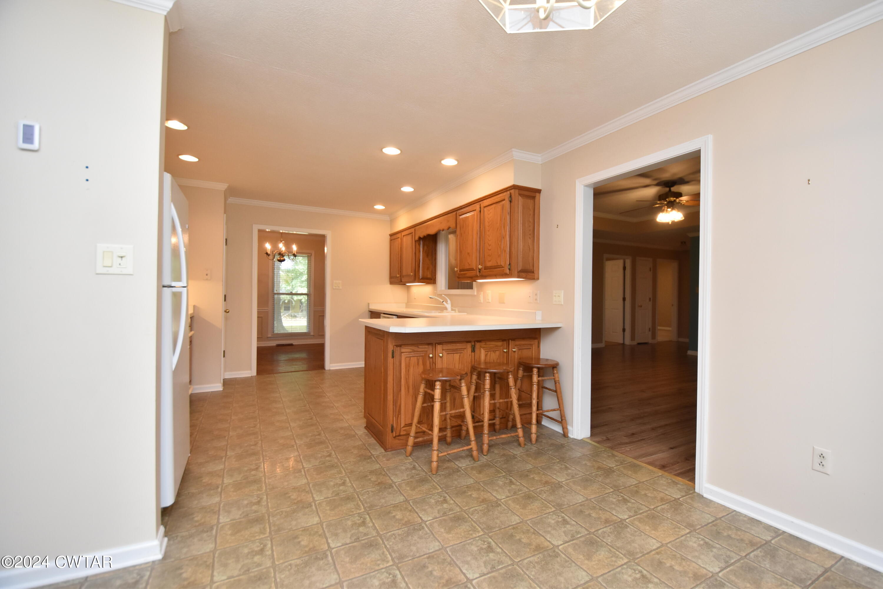 63 Deep Gap Road Jackson, TN 38301 - Photo 8 of 31 a living room with a table and chairs