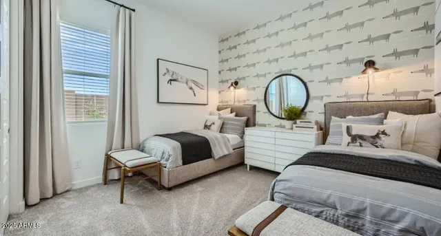 a bedroom with bed and a window