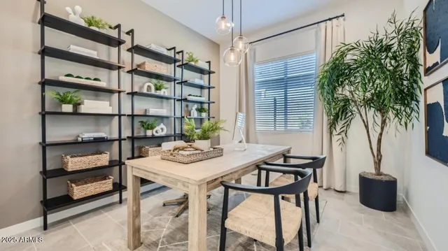 a view of a livingroom with furniture and window