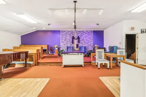 a view of a livingroom with furniture and a rug