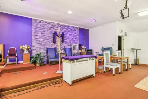 a view of a living room and kitchen