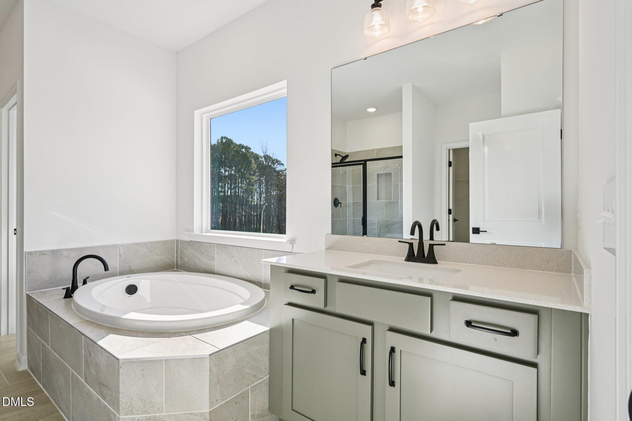 716 Compeer Way, Unit 25 Rolesville, NC 27571 - Photo 18 of 39 Primary Bath