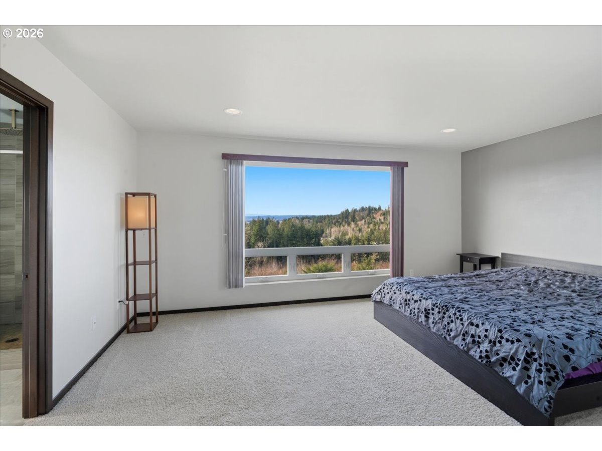 163 Yates Road Chehalis, WA 98532 - Photo 14 of 33 a living room with a bed furniture and next to a window