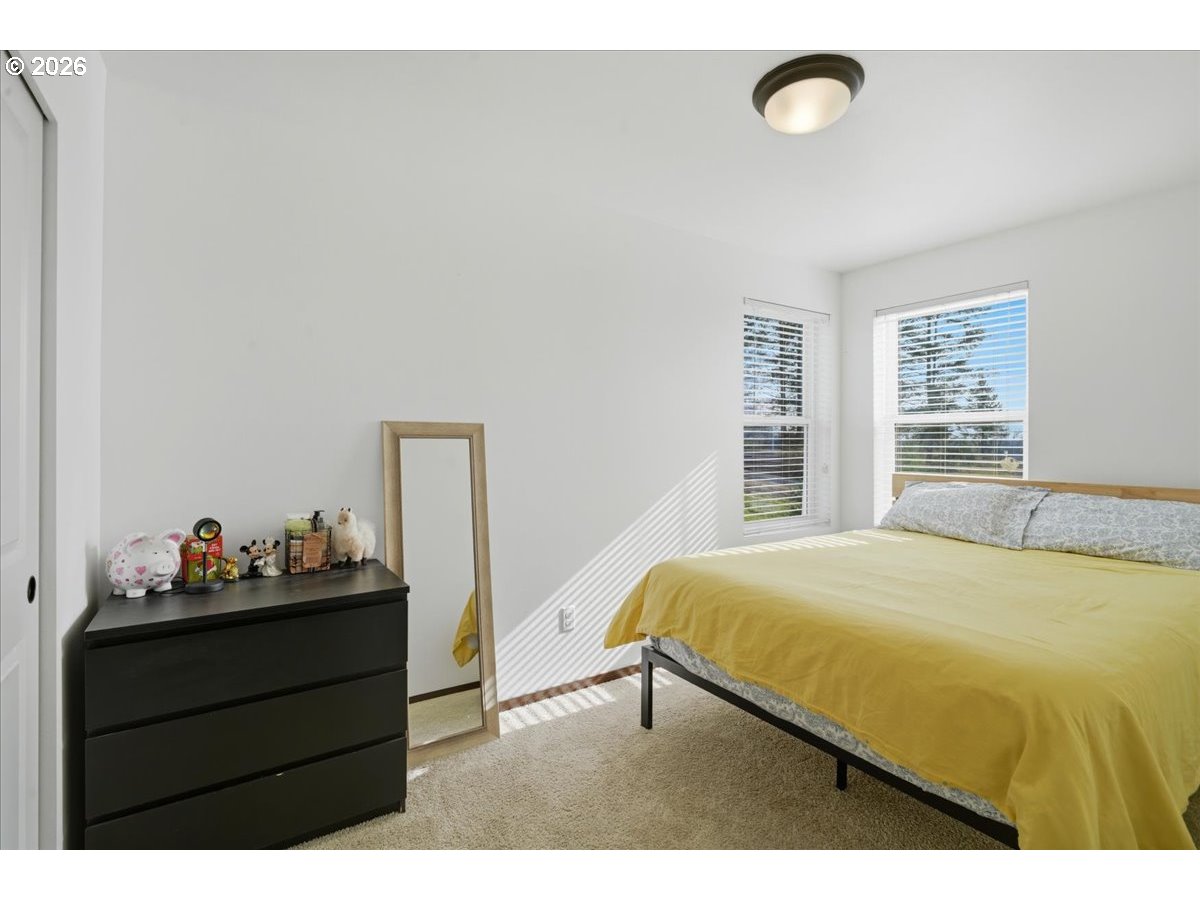 163 Yates Road Chehalis, WA 98532 - Photo 19 of 33 a bedroom with a bed and a window