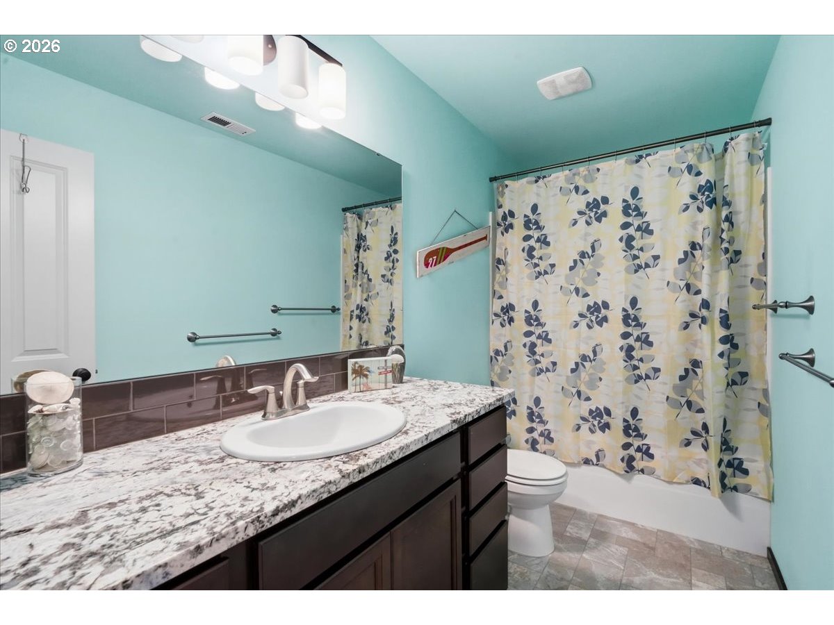 163 Yates Road Chehalis, WA 98532 - Photo 21 of 33 a bathroom with a granite countertop sink and a mirror