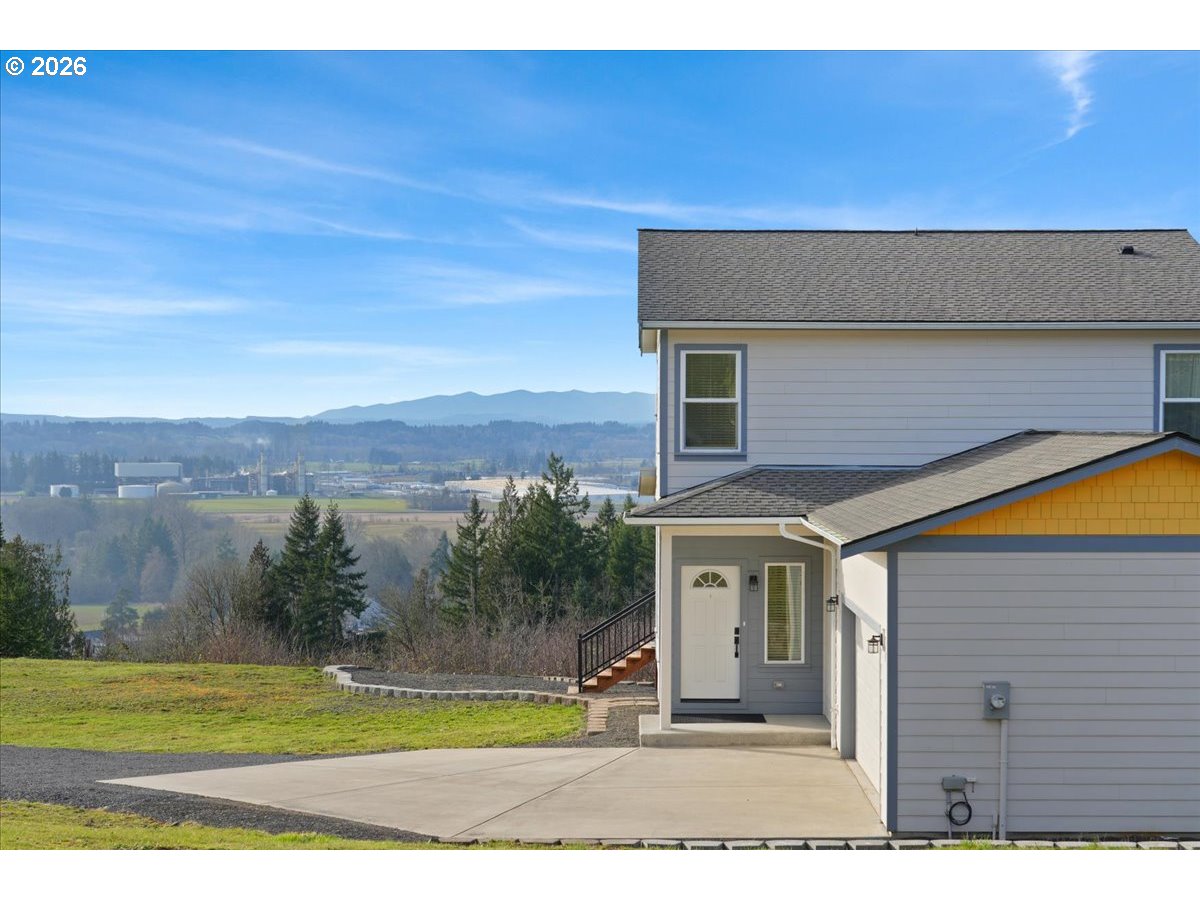 163 Yates Road Chehalis, WA 98532 - Photo 27 of 33 a view of a house with a yard
