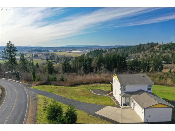 a view of a lake with a yard