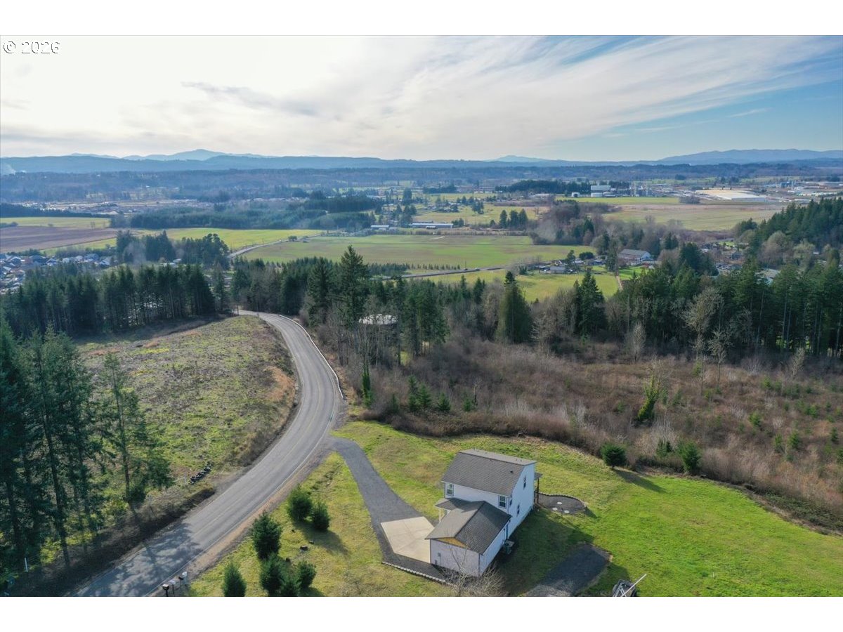 163 Yates Road Chehalis, WA 98532 - Photo 31 of 33 a view of a lake with a yard