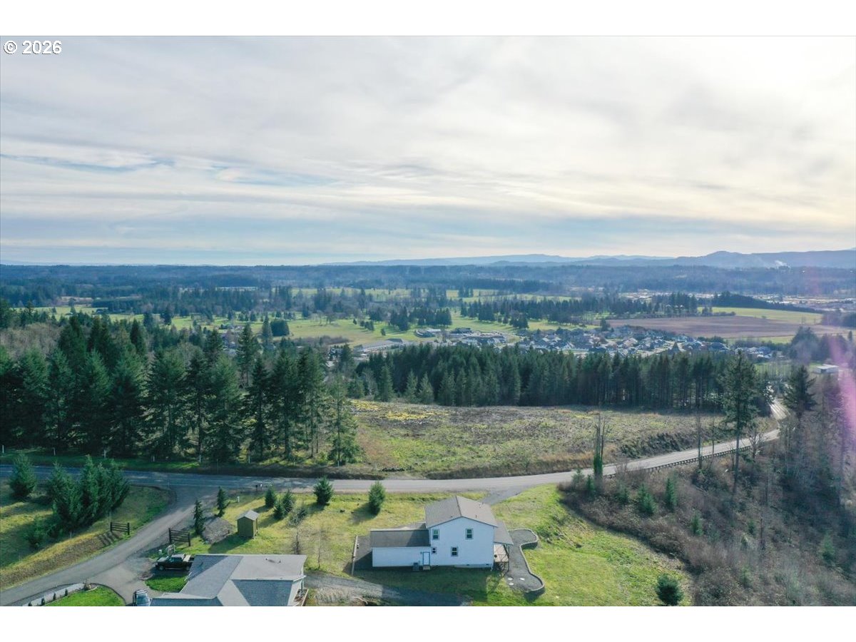 163 Yates Road Chehalis, WA 98532 - Photo 32 of 33 an aerial view of mountain with trees