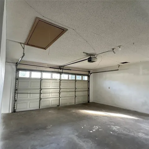 a view of a garden with an outdoor space