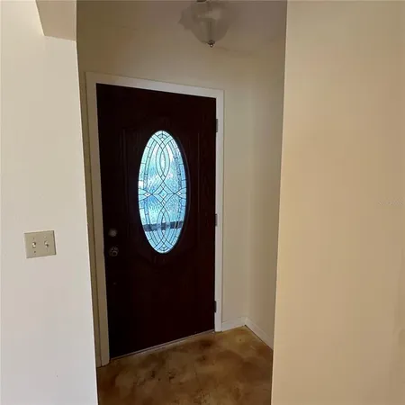a view of livingroom with washer and dryer