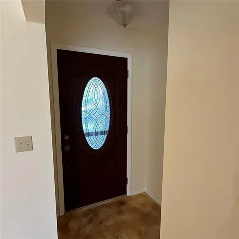 a view of livingroom with washer and dryer