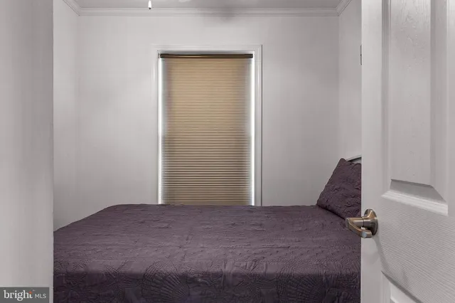 a bedroom with a bed