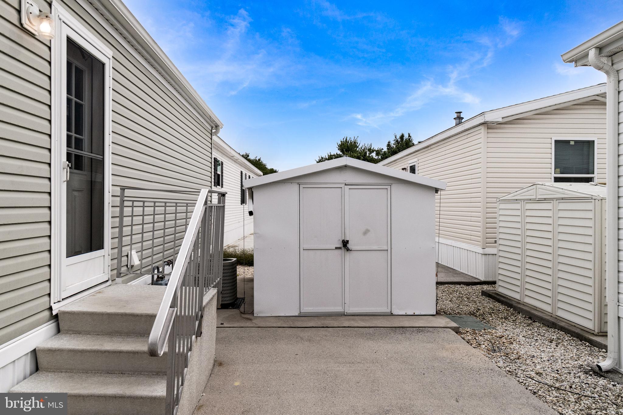 1402 South Rte 9, Unit 25 Cape May Court House, NJ 08210 - Photo 28 of 32 a view of a house with backyard