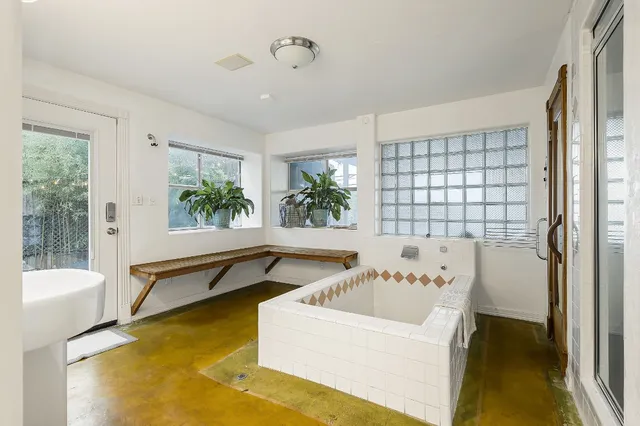 a bathroom with a sink and a bathtub