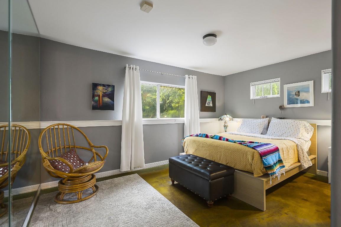 1007 East 8th Street Austin, TX 78702 - Photo 26 of 37 a bedroom with a bed and window