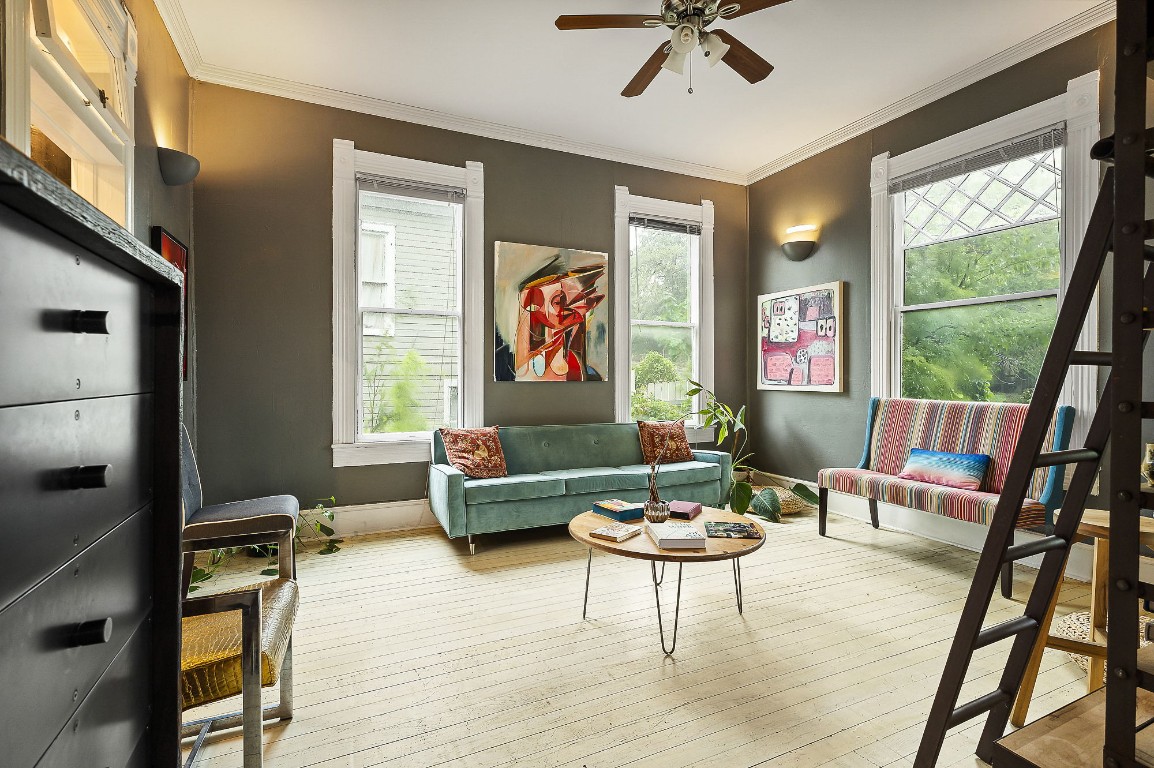 1007 East 8th Street Austin, TX 78702 - Photo 5 of 37 a living room with furniture and floor to ceiling windows