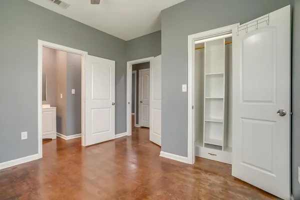 wooden floor with white walls