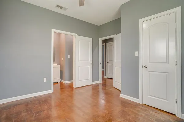wooden floor with white walls