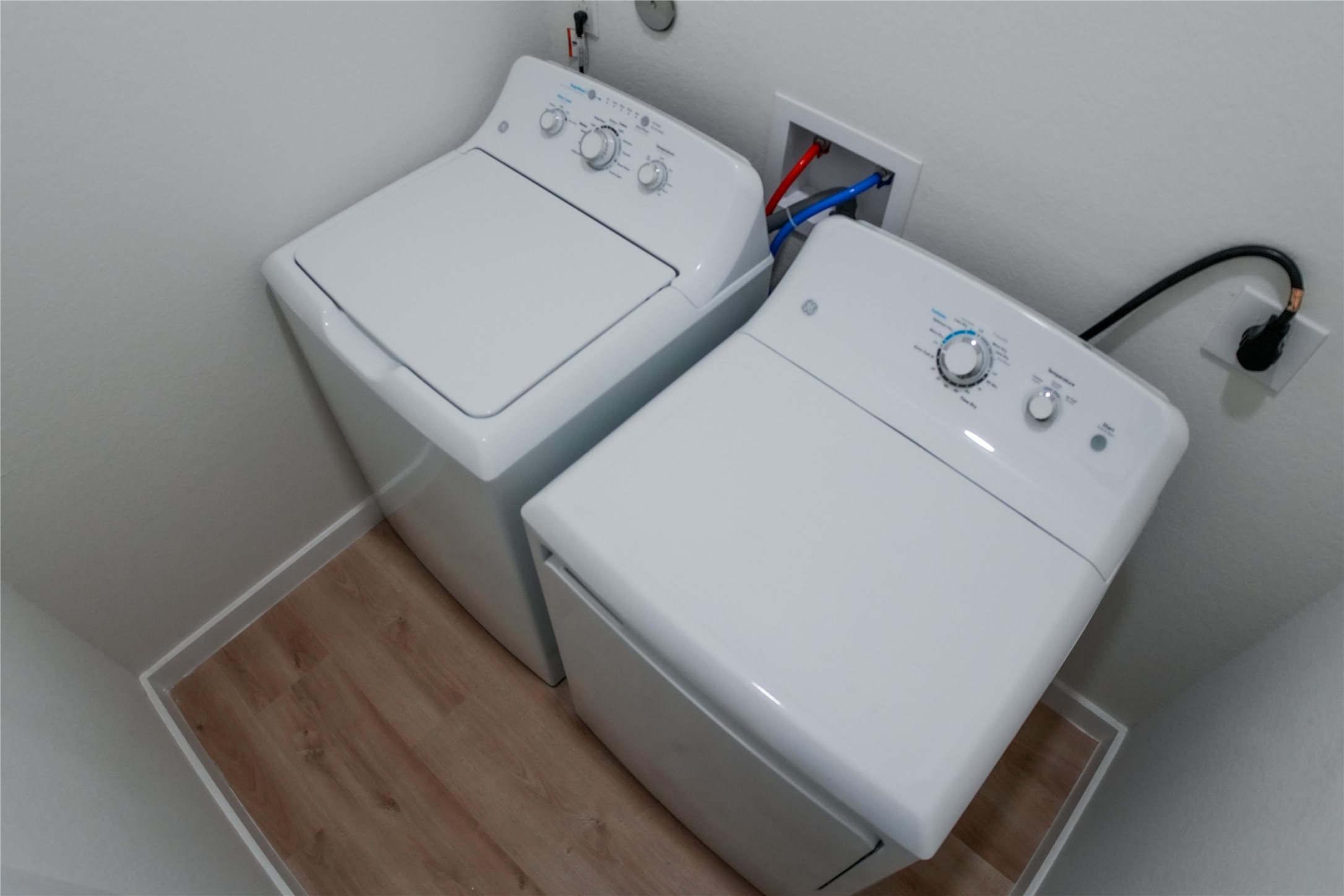 9705 Garcroft Street, Unit A Houston, TX 77029 - Photo 11 of 12 a utility room with dryer and washer
