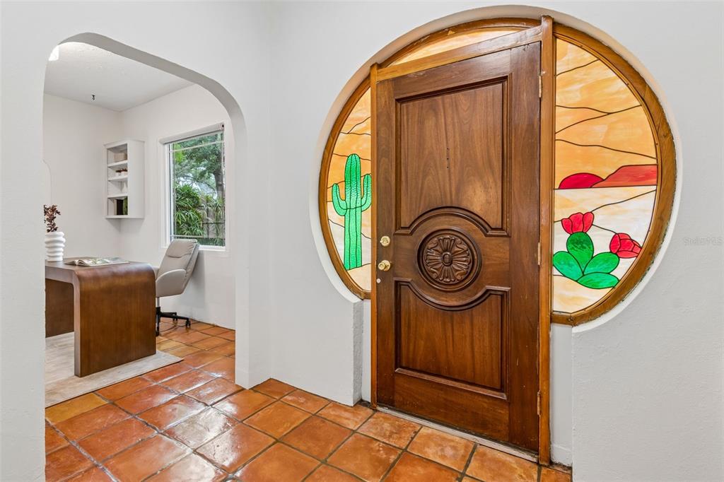 2434 West Prospect Road Tampa, FL 33629 - Photo 4 of 45 a view of an entryway with furniture and garden view
