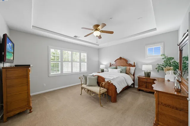 a utility room with sink dryer and washer