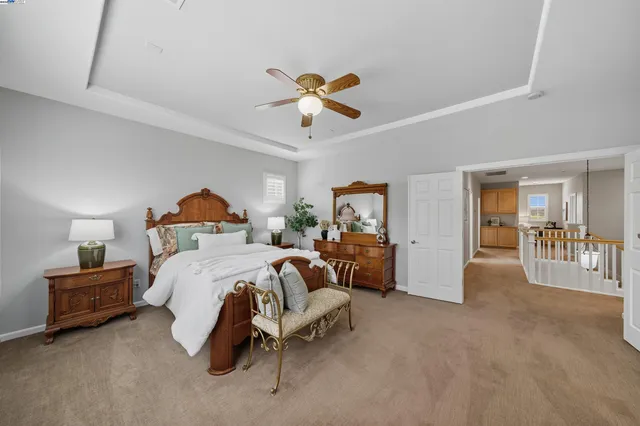 a view of a patio with table and chairs potted plants with wooden floor