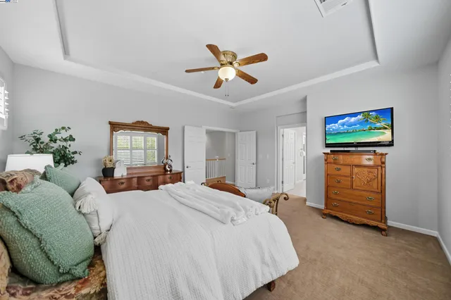 a view of a swimming pool with a yard