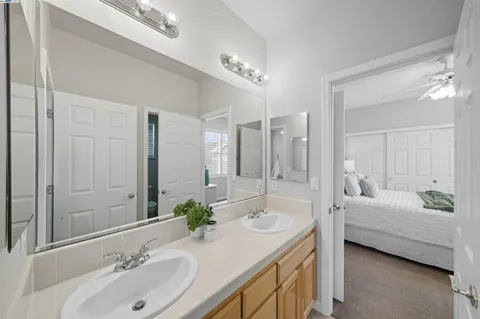 a view of a patio with table and chairs potted plants with wooden floor