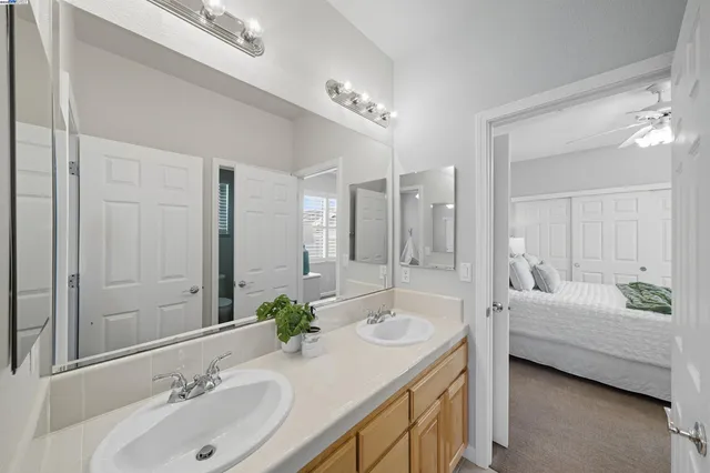 a view of a patio with table and chairs