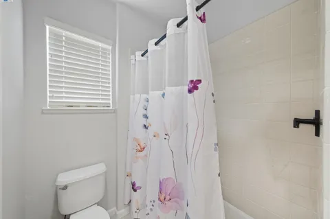 a view of a swimming pool with a yard