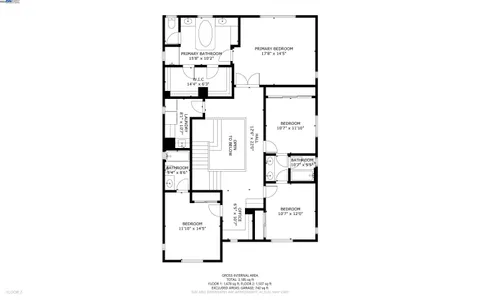 front view of a house with potted plants