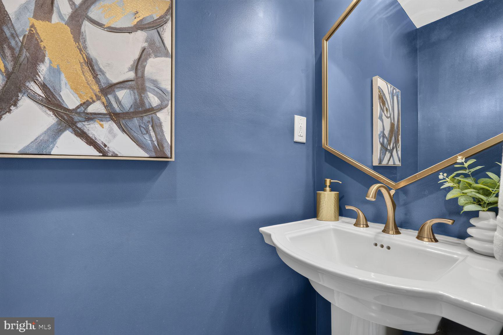 641 11th Street Northeast Washington, DC 20002 - Photo 11 of 22 Chic blue-hued powder room elegance.