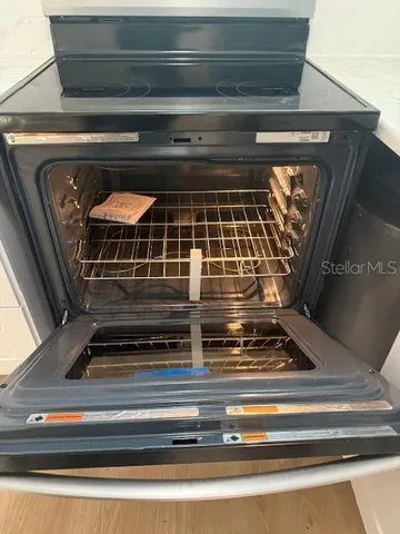 a bathroom with a glass door shower