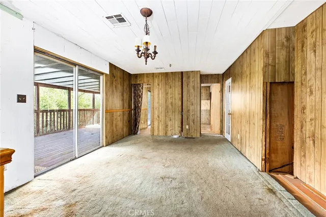 a kitchen with a stove and a refrigerator