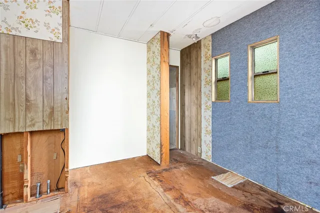 a view of balcony with wooden floor