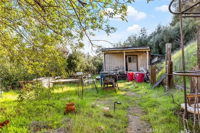 a view of a swimming pool with back yard