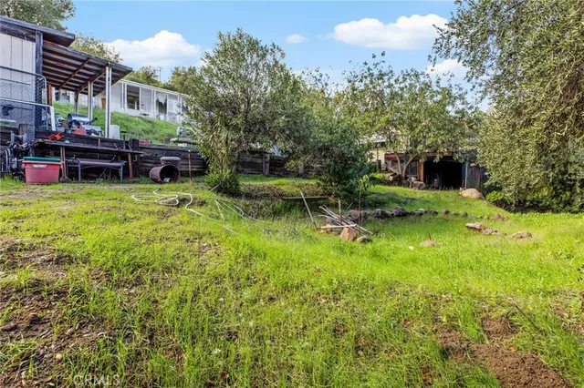 a view of house with yard