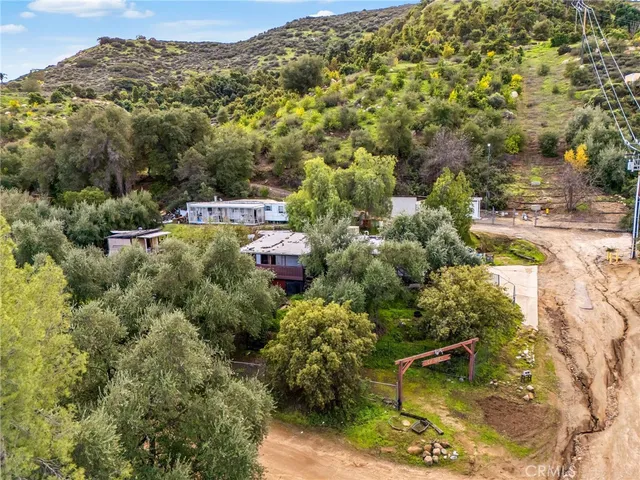 an aerial view of a house with a garden